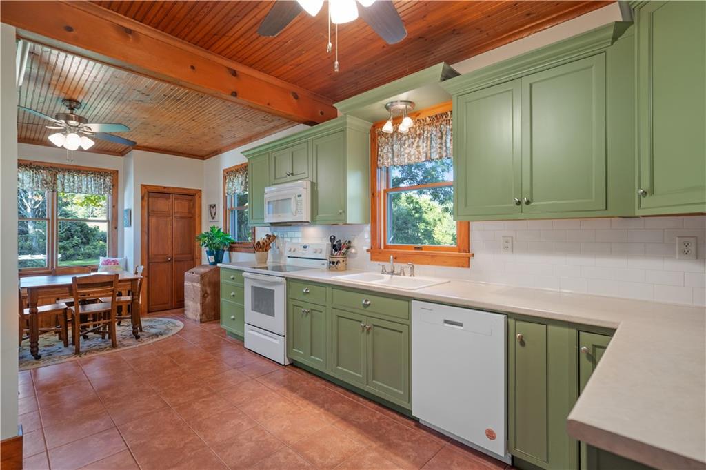 645 Cemetery Road Perryopolis, PA 15473 - Photo 14 of 31 a kitchen with sink cabinets and window