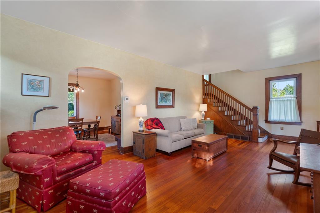 645 Cemetery Road Perryopolis, PA 15473 - Photo 18 of 31 a living room with furniture and a wooden floor