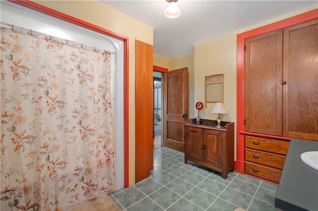 645 Cemetery Road Perryopolis, PA 15473 - Photo 22 of 31 a kitchen with stainless steel appliances granite countertop a refrigerator and a sink