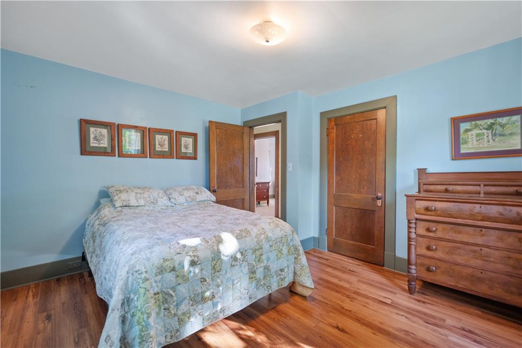 645 Cemetery Road Perryopolis, PA 15473 - Photo 25 of 31 a bedroom with a bed and a dresser