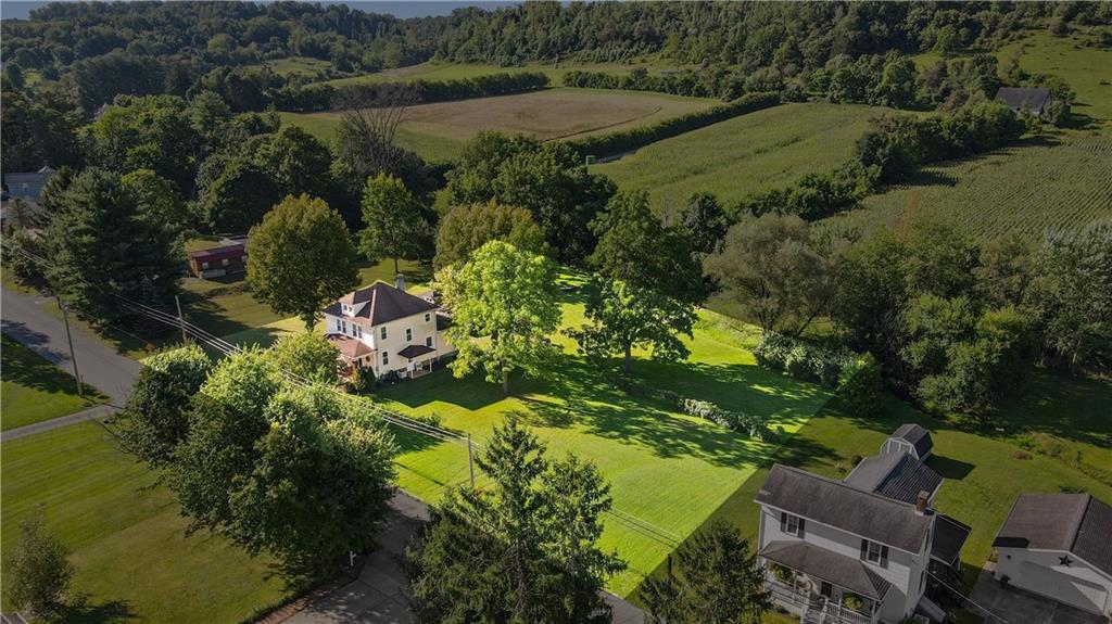 645 Cemetery Road Perryopolis, PA 15473 - Photo 30 of 31 an aerial view of residential houses with outdoor space and trees all around