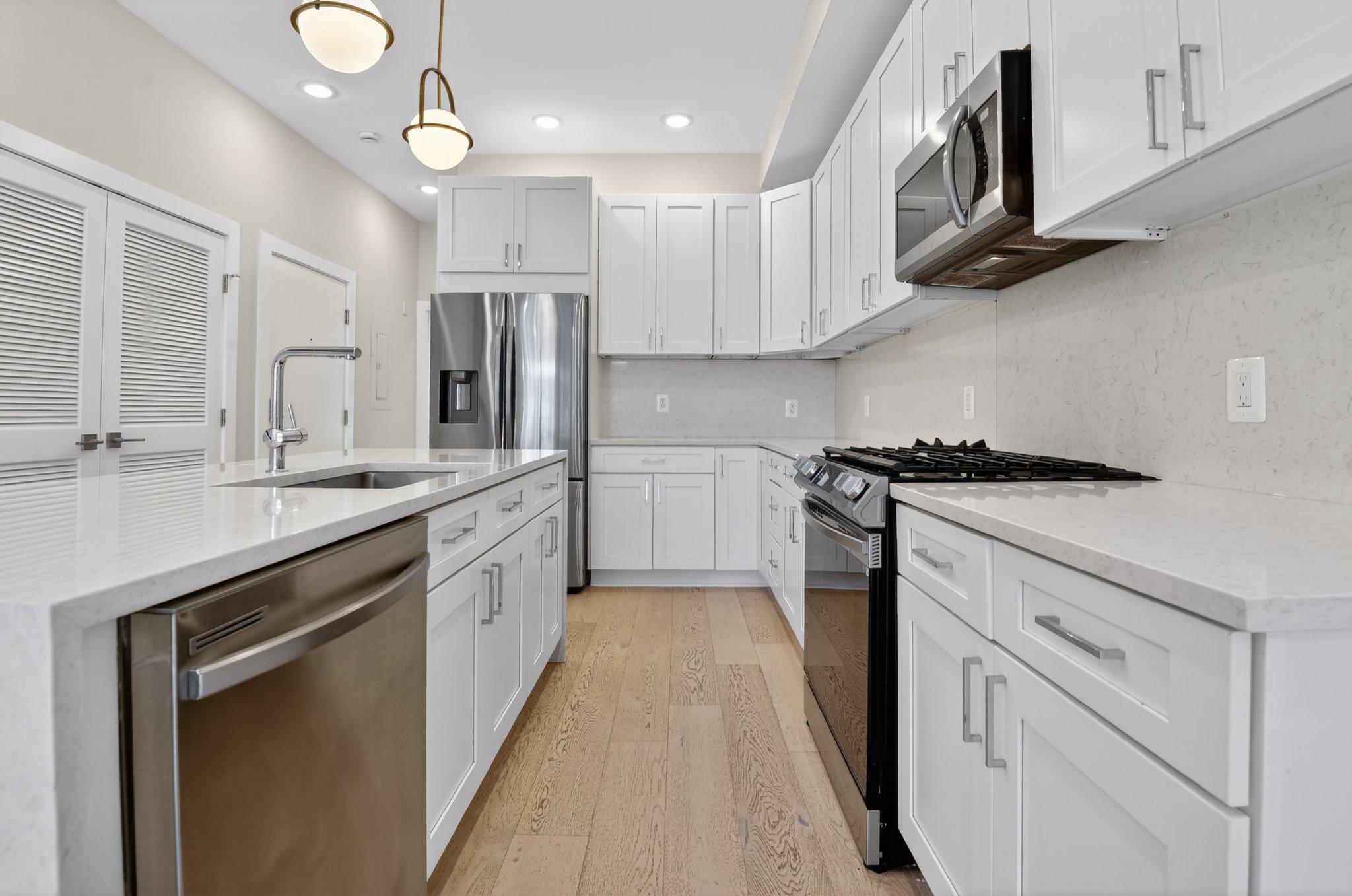 217 20th Street Northeast, Unit 2 Washington, DC 20002 - Photo 6 of 17 Sleek modern kitchen High end appliances
