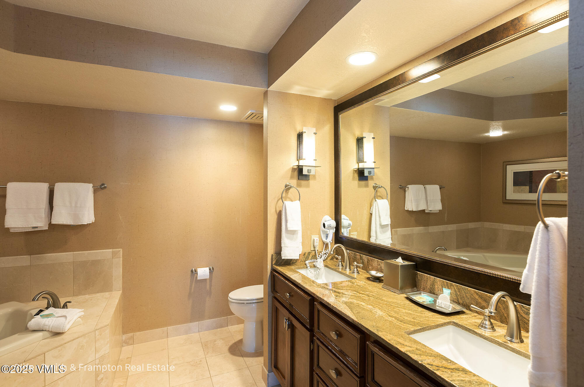 210 Offerson Road, Unit R317 WEEK 4 Beaver Creek, CO 81620 - Photo 13 of 29 a bathroom with a granite countertop sink mirror vanity and toilet