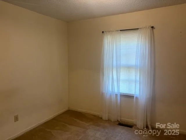 an empty room with closet