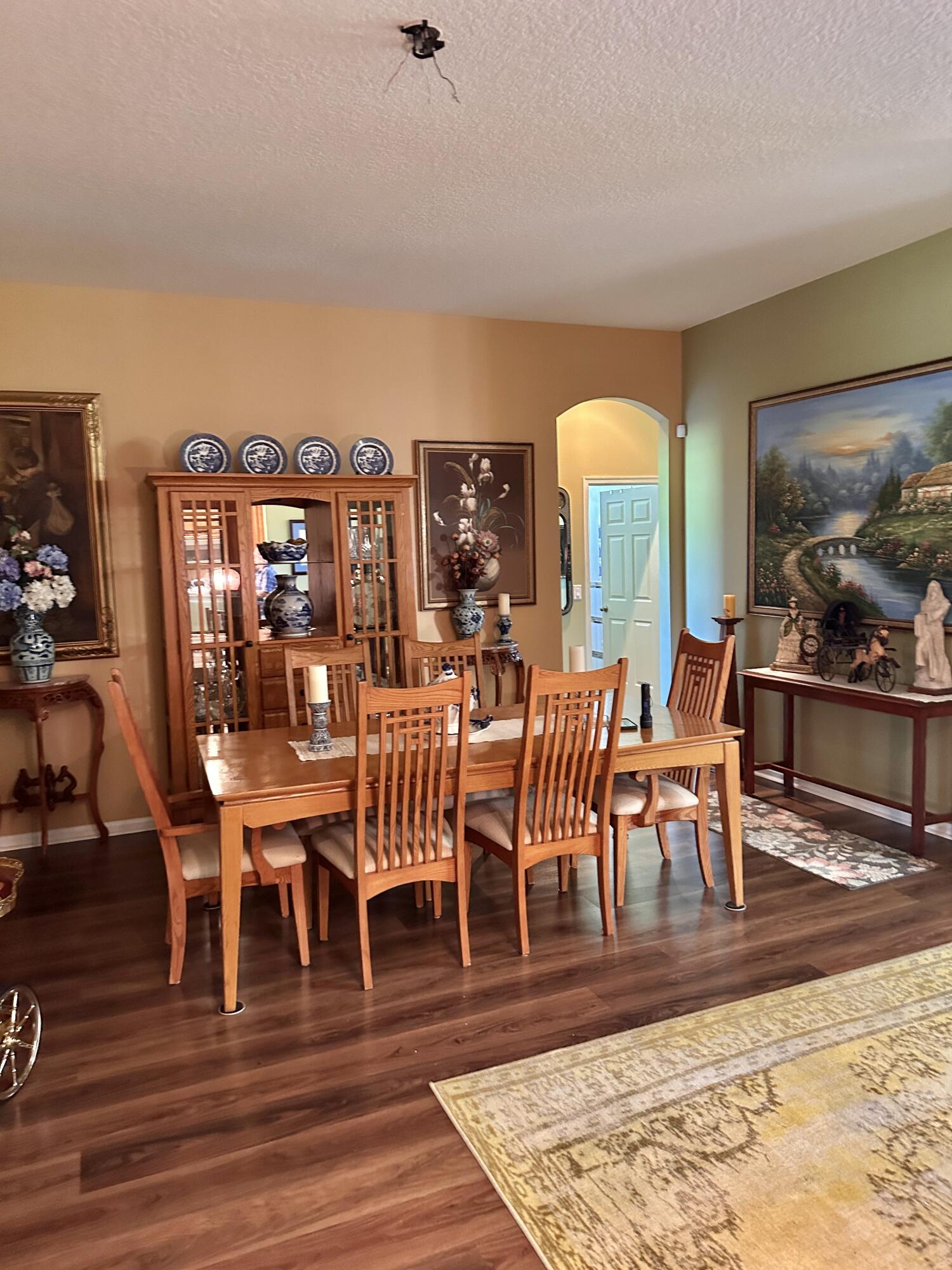 14085 86th Road North Loxahatchee, FL 33470 - Photo 15 of 28 a living room with lots of furniture and wooden floor