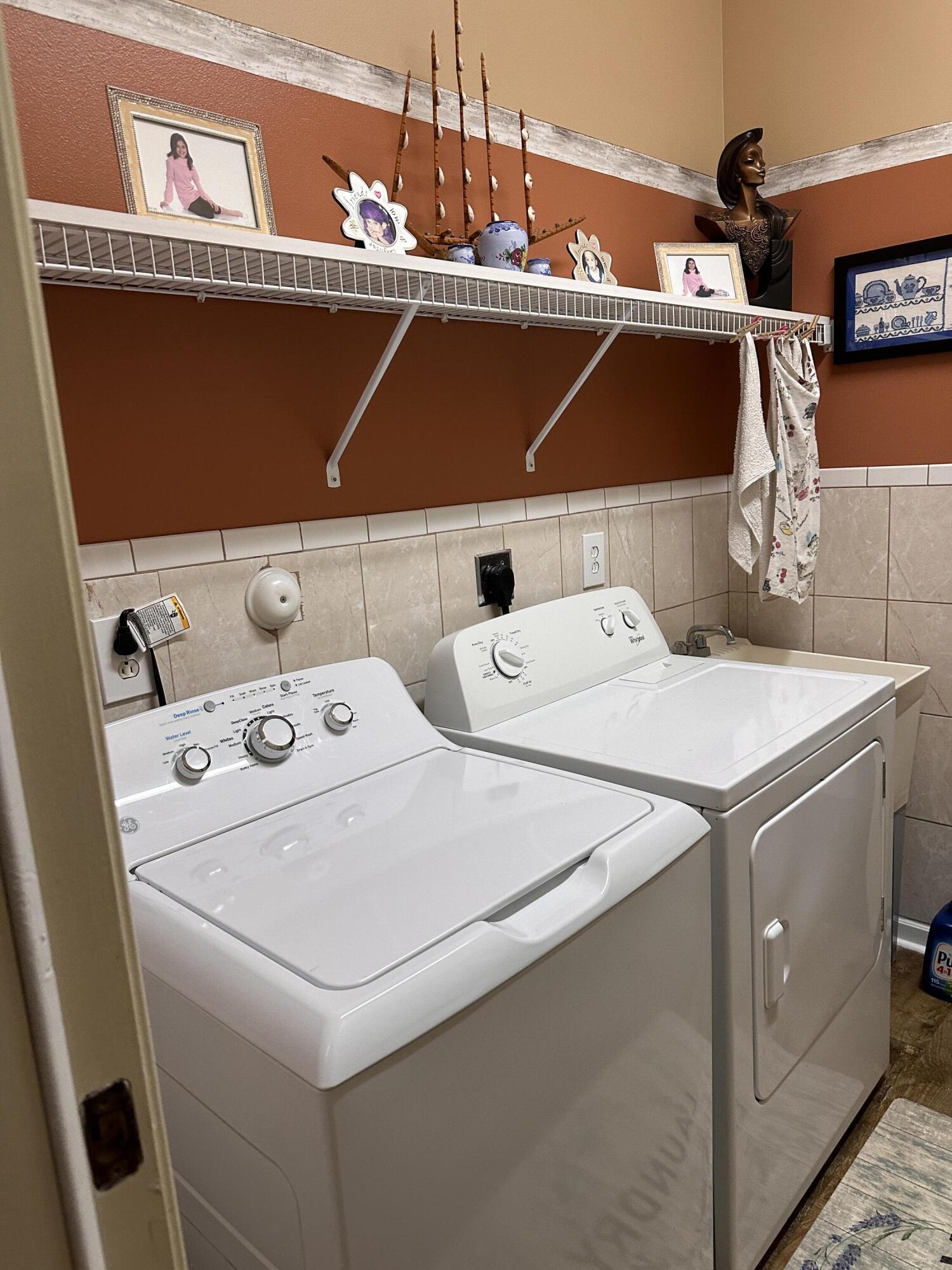 14085 86th Road North Loxahatchee, FL 33470 - Photo 19 of 28 a utility room with dryer and washer