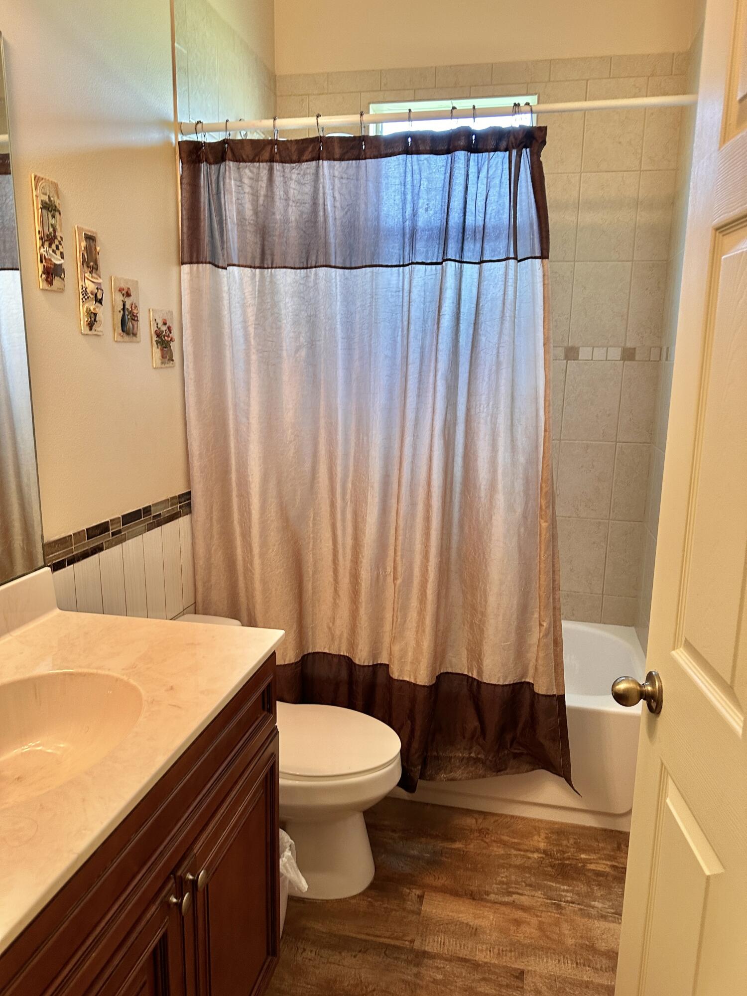 14085 86th Road North Loxahatchee, FL 33470 - Photo 26 of 28 a bathroom with a sink and toilet