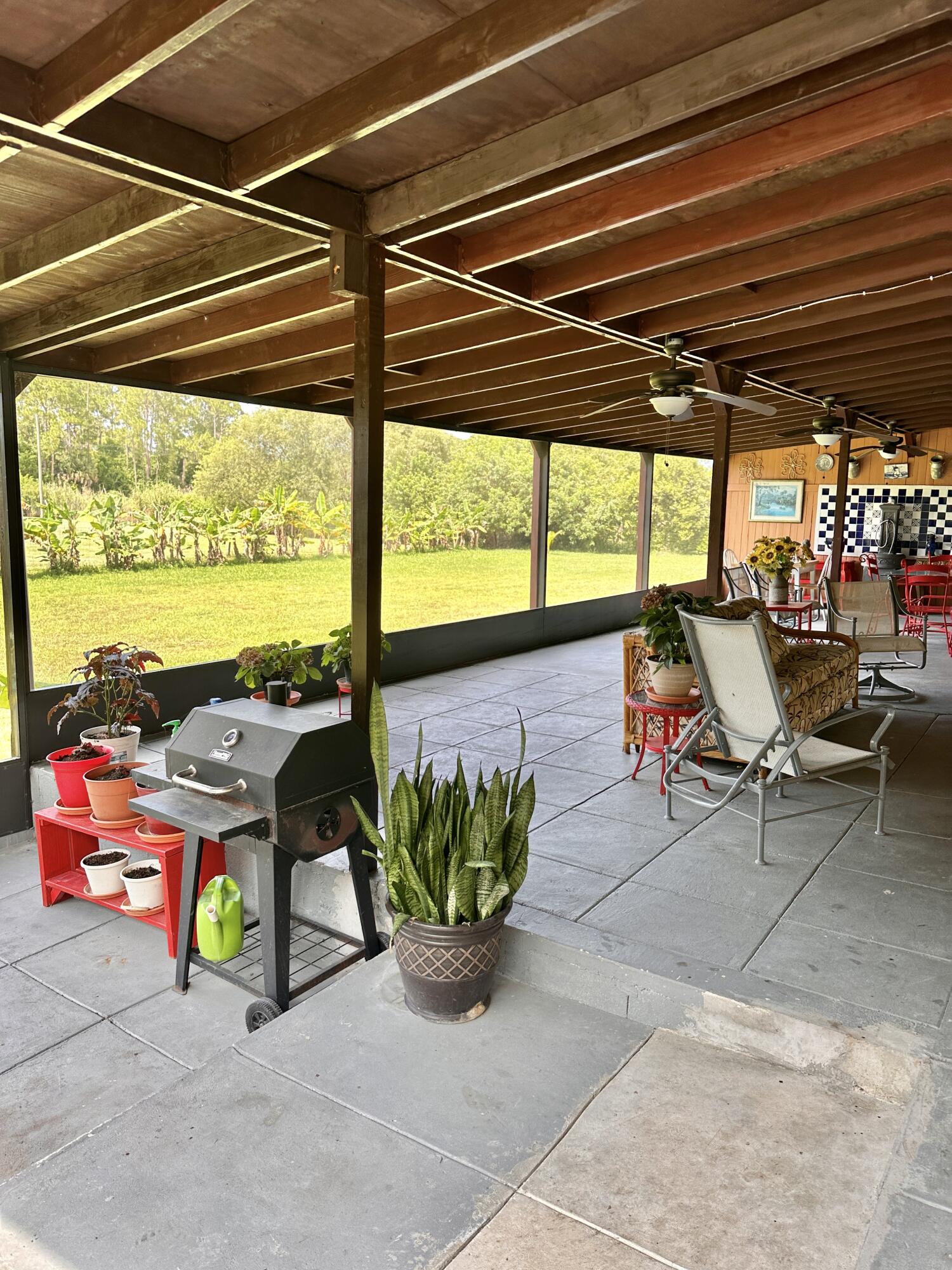 14085 86th Road North Loxahatchee, FL 33470 - Photo 28 of 28 a view of a room with gym equipment