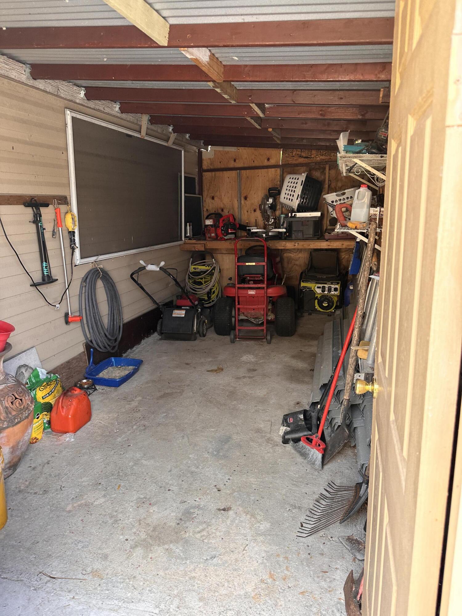 14085 86th Road North Loxahatchee, FL 33470 - Photo 10 of 28 a view of a room with gym equipment