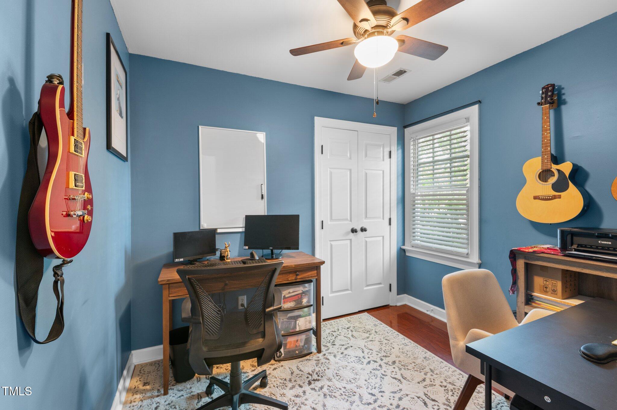 3541 East Jameson Road Raleigh, NC 27604 - Photo 18 of 38 a view of a workspace with furniture and a window