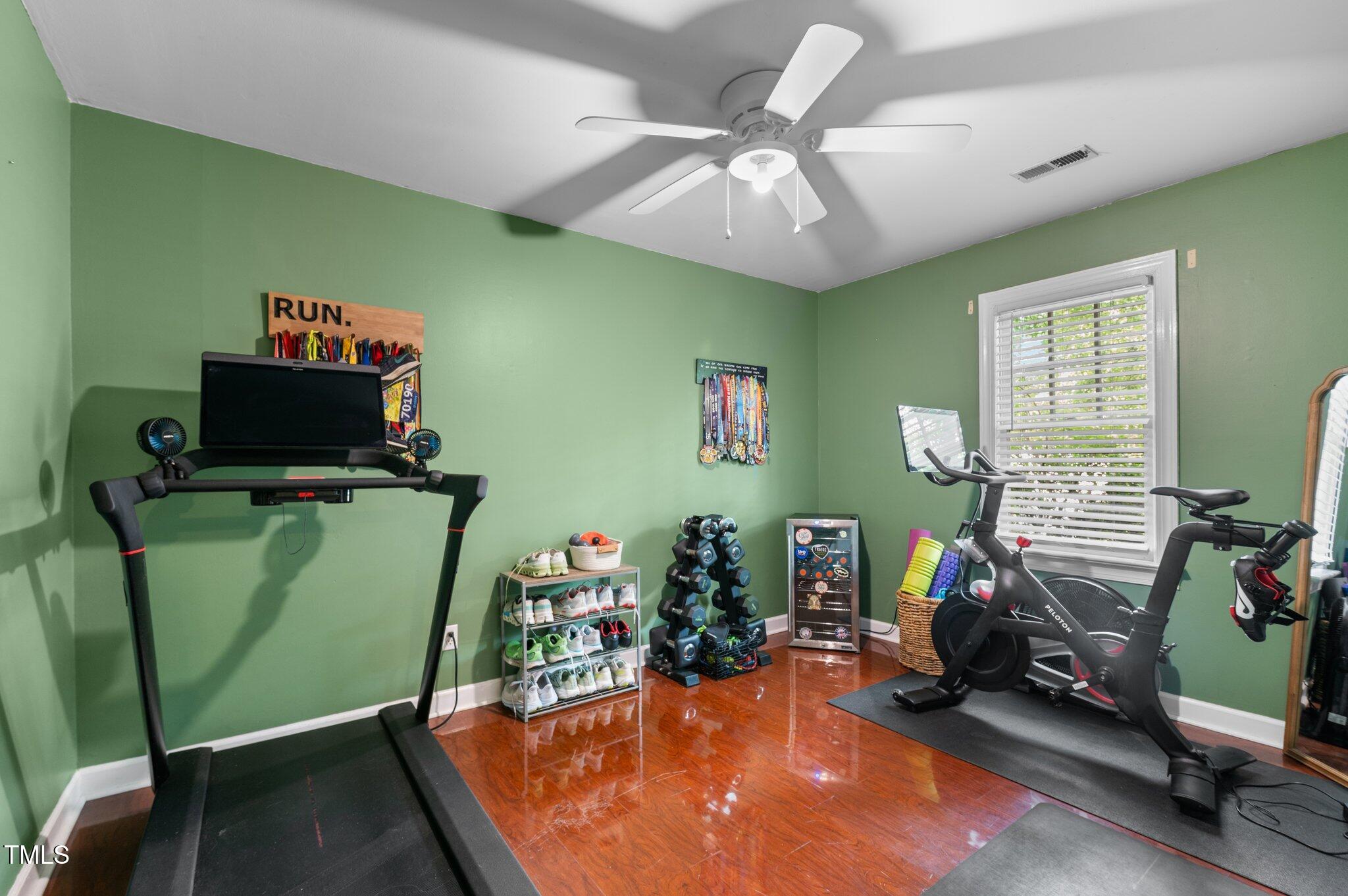 3541 East Jameson Road Raleigh, NC 27604 - Photo 20 of 38 a room with furniture and a flat screen tv