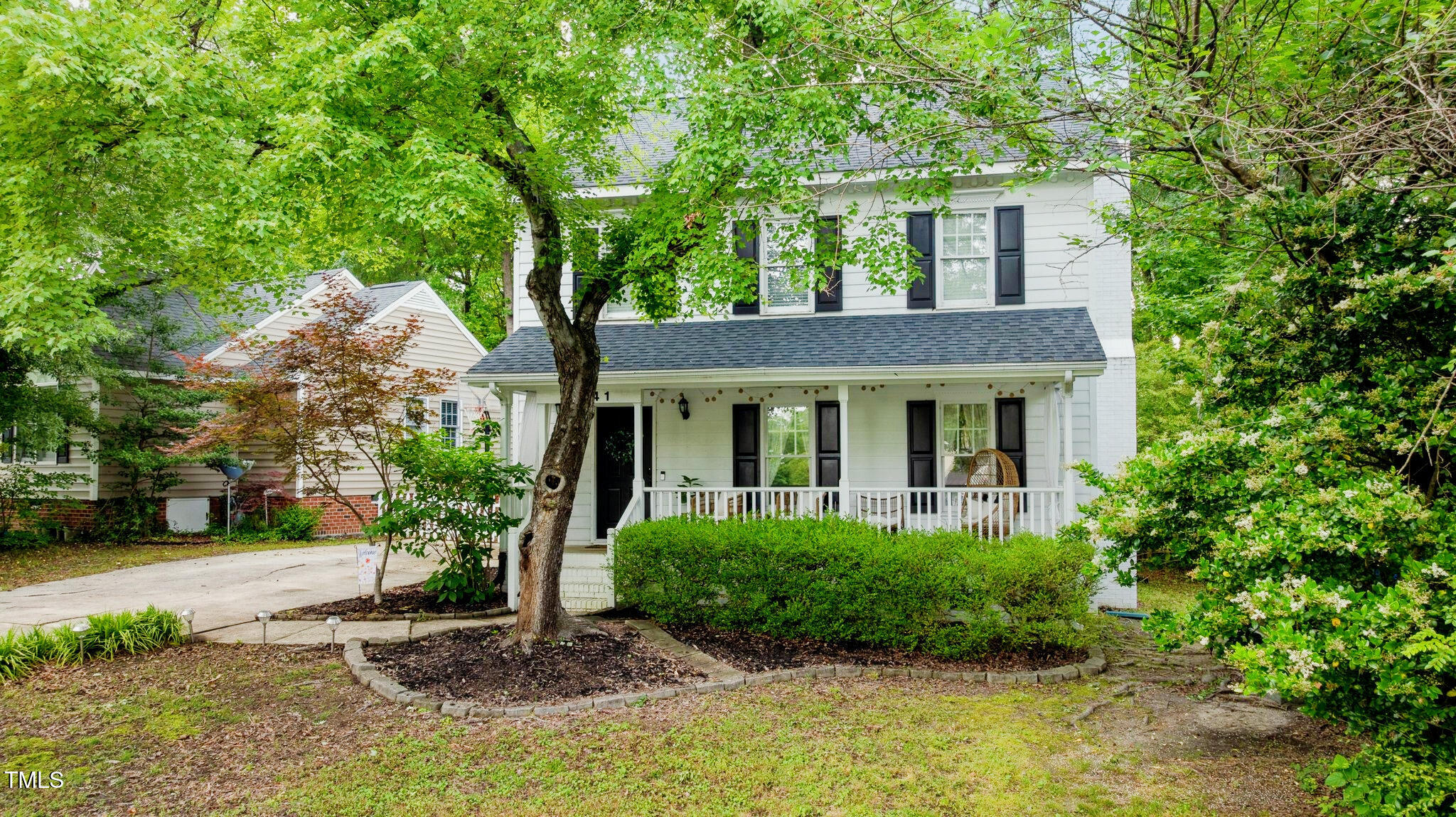 3541 East Jameson Road Raleigh, NC 27604 - Photo 2 of 38 a front view of a house with garden