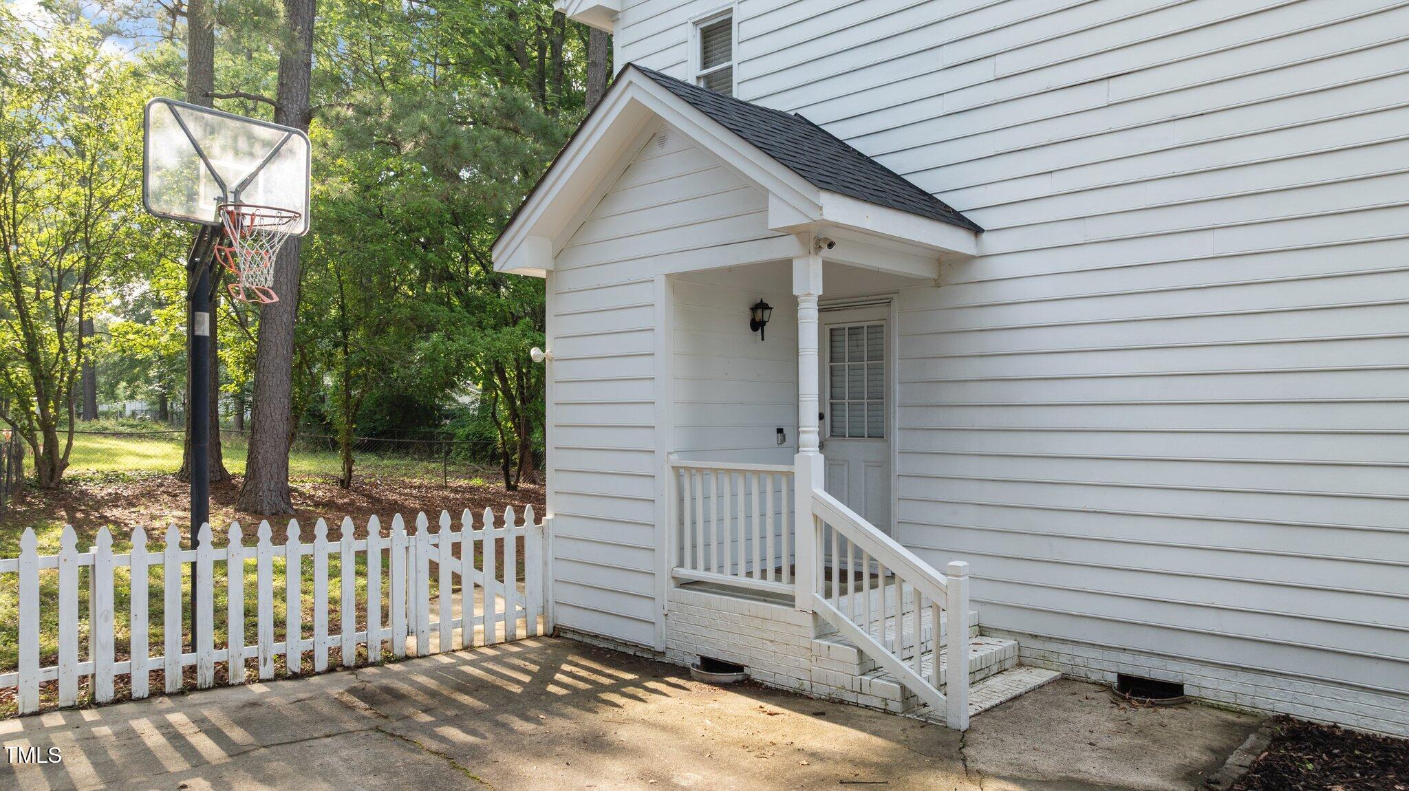3541 East Jameson Road Raleigh, NC 27604 - Photo 29 of 38 a view of a house with wooden fence