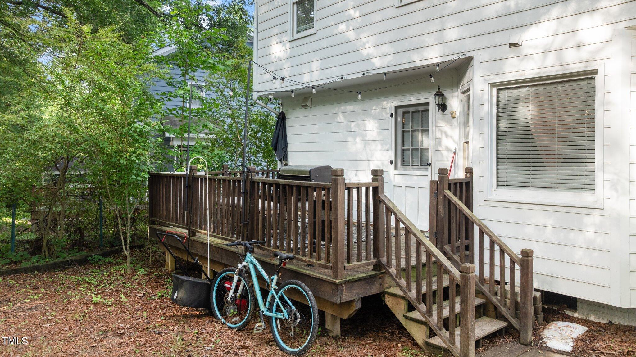 3541 East Jameson Road Raleigh, NC 27604 - Photo 32 of 38 a view of a chair with wooden fence