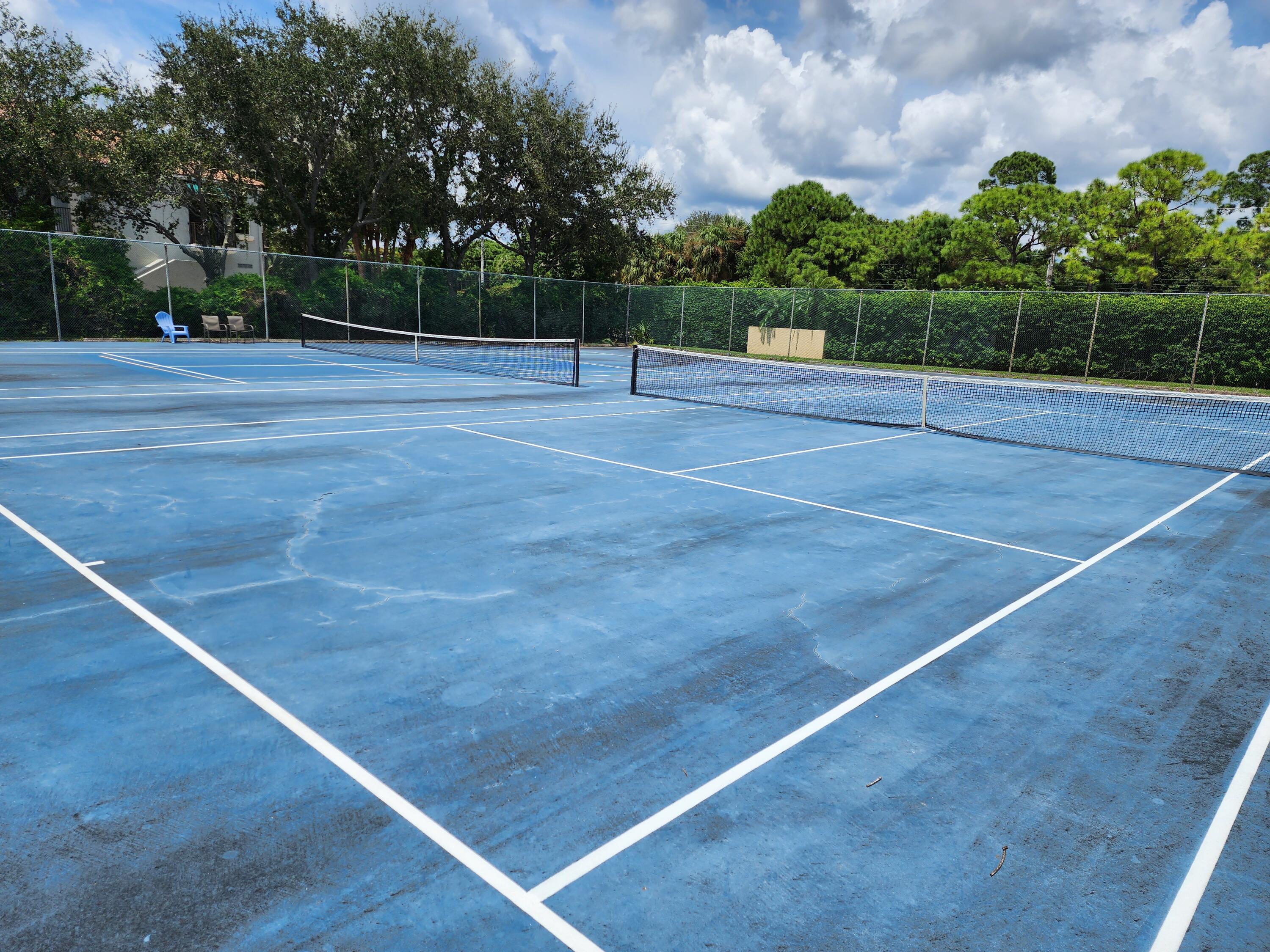 5344 Woodland Lakes Drive, Unit 223 Palm Beach Gardens, FL 33418 - Photo 42 of 46 a view of outdoor space