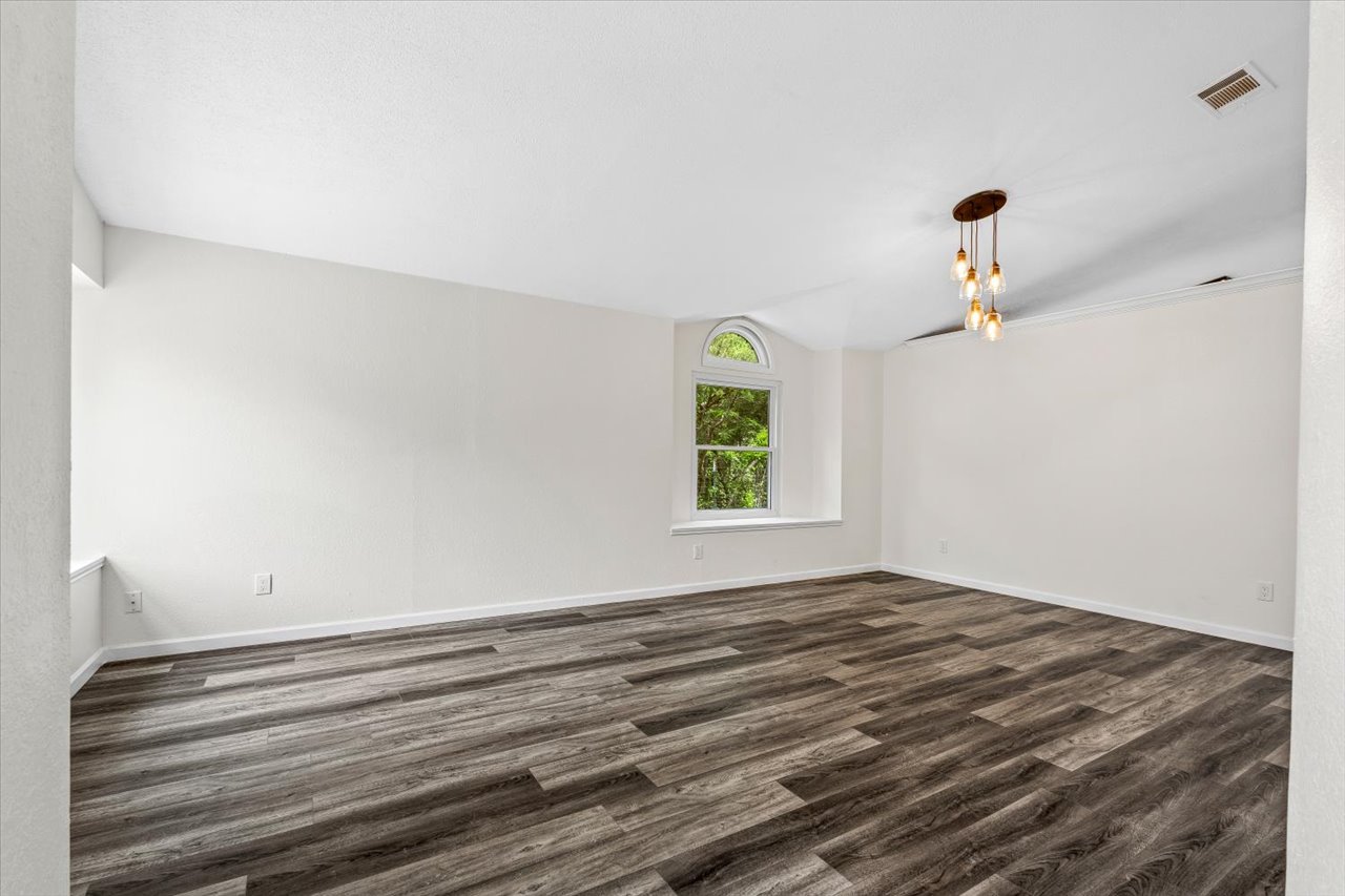 4004 Danli Lane Austin, TX 78749 - Photo 4 of 40 a view of room with window and ceiling fan