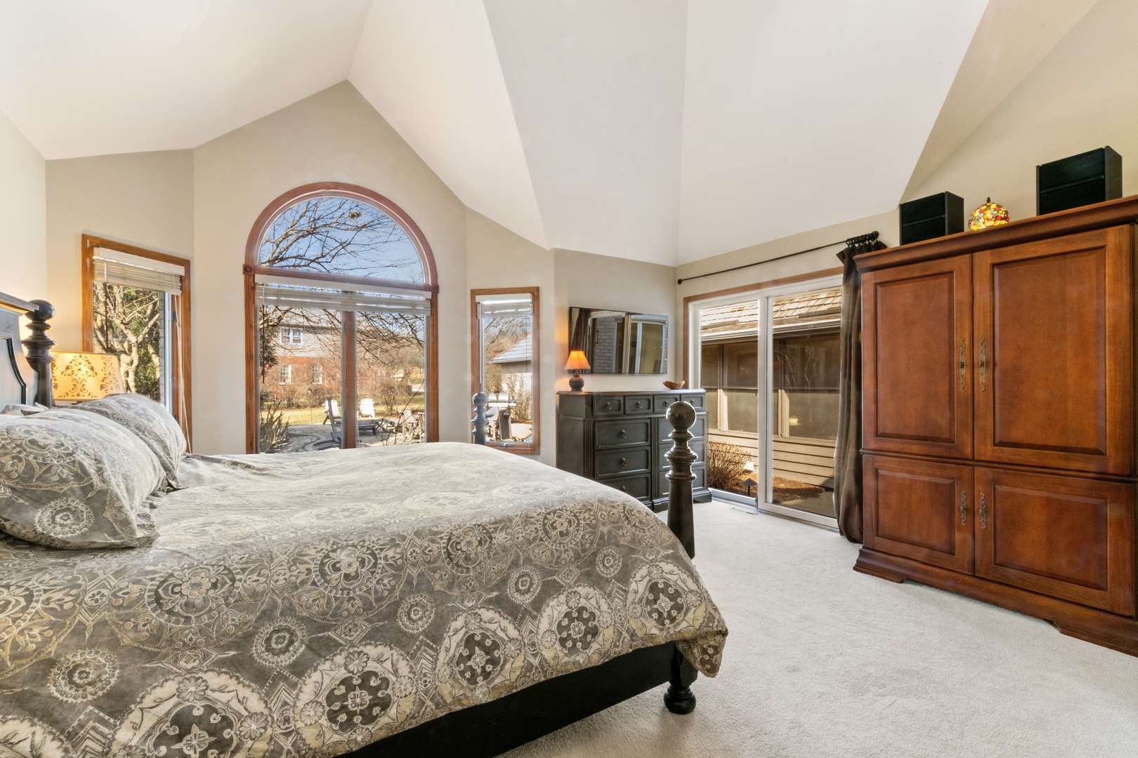 13610 South Kickapoo Trail Homer Glen, IL 60491 - Photo 14 of 37 a bedroom with a large bed and a large window