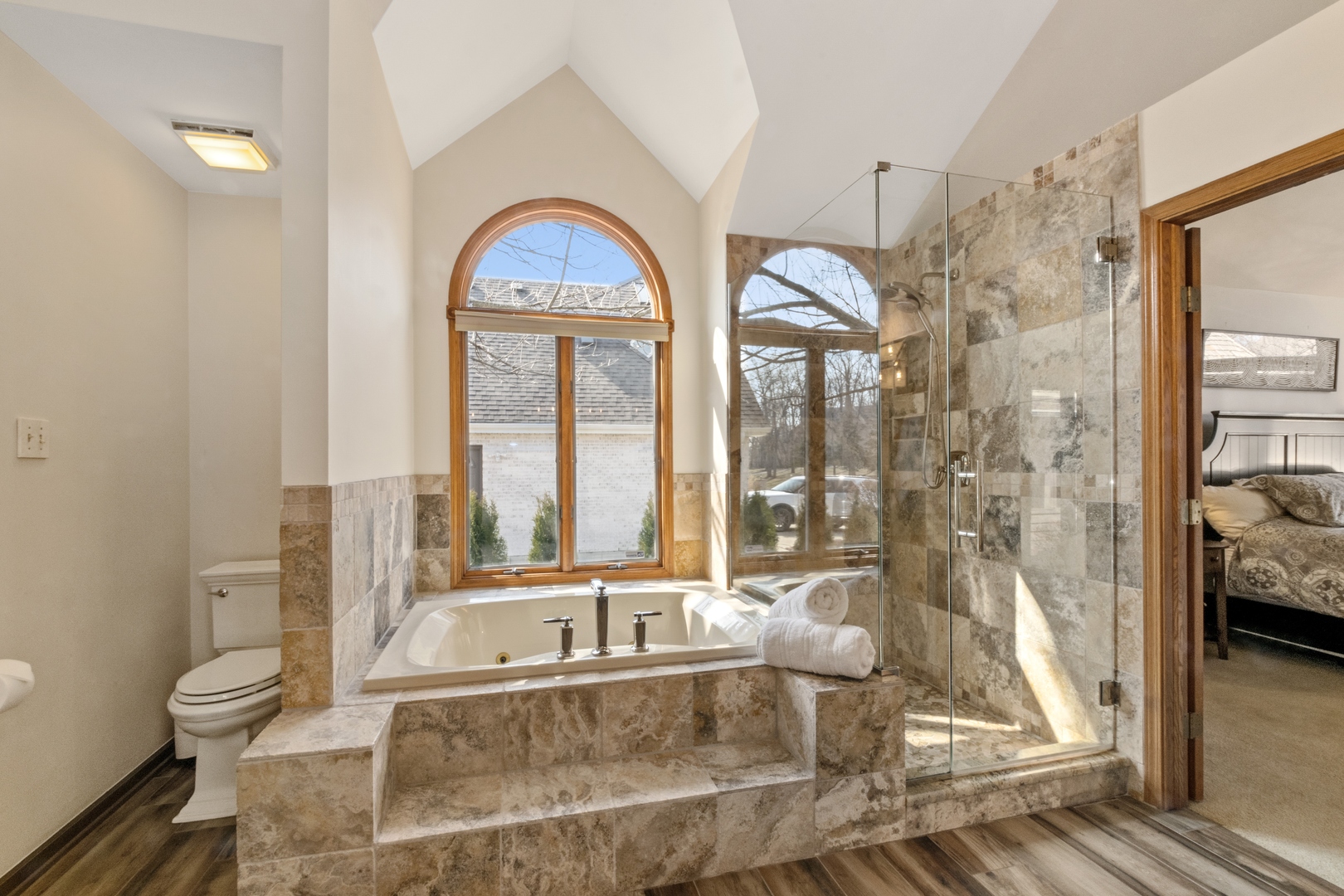 13610 South Kickapoo Trail Homer Glen, IL 60491 - Photo 16 of 37 a living room with couches a table and a large mirror with wooden floor