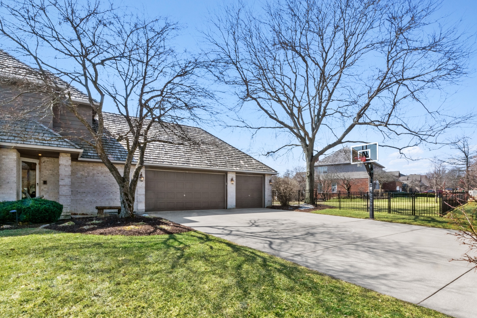 13610 South Kickapoo Trail Homer Glen, IL 60491 - Photo 2 of 37 a front view of house with yard and green space