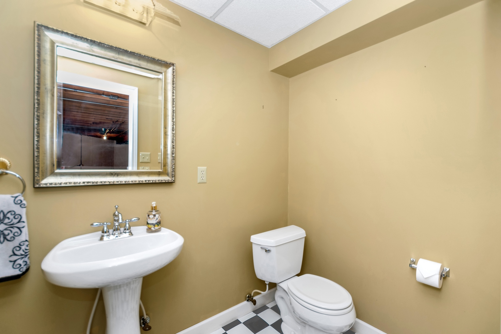 13610 South Kickapoo Trail Homer Glen, IL 60491 - Photo 24 of 37 a bathroom with a toilet a sink and mirror
