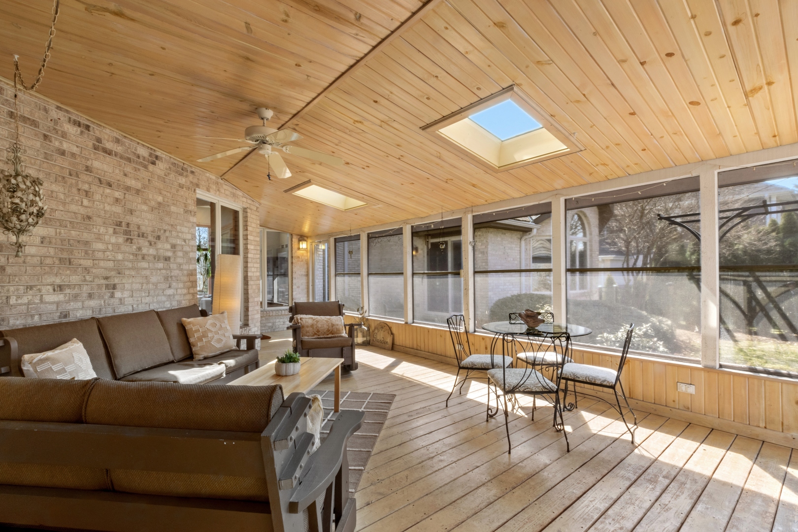 13610 South Kickapoo Trail Homer Glen, IL 60491 - Photo 25 of 37 a living room with furniture and a floor to ceiling window