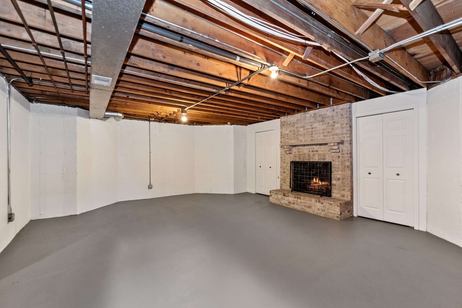 13610 South Kickapoo Trail Homer Glen, IL 60491 - Photo 27 of 37 a view of an empty room with a fireplace