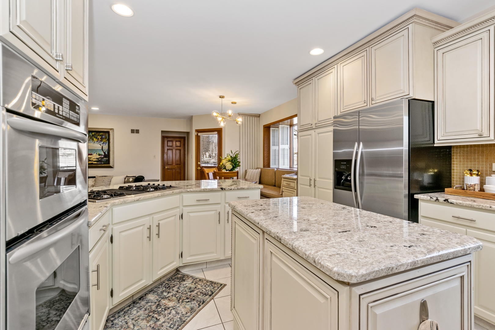 13610 South Kickapoo Trail Homer Glen, IL 60491 - Photo 6 of 37 a kitchen with stainless steel appliances granite countertop a sink and cabinets