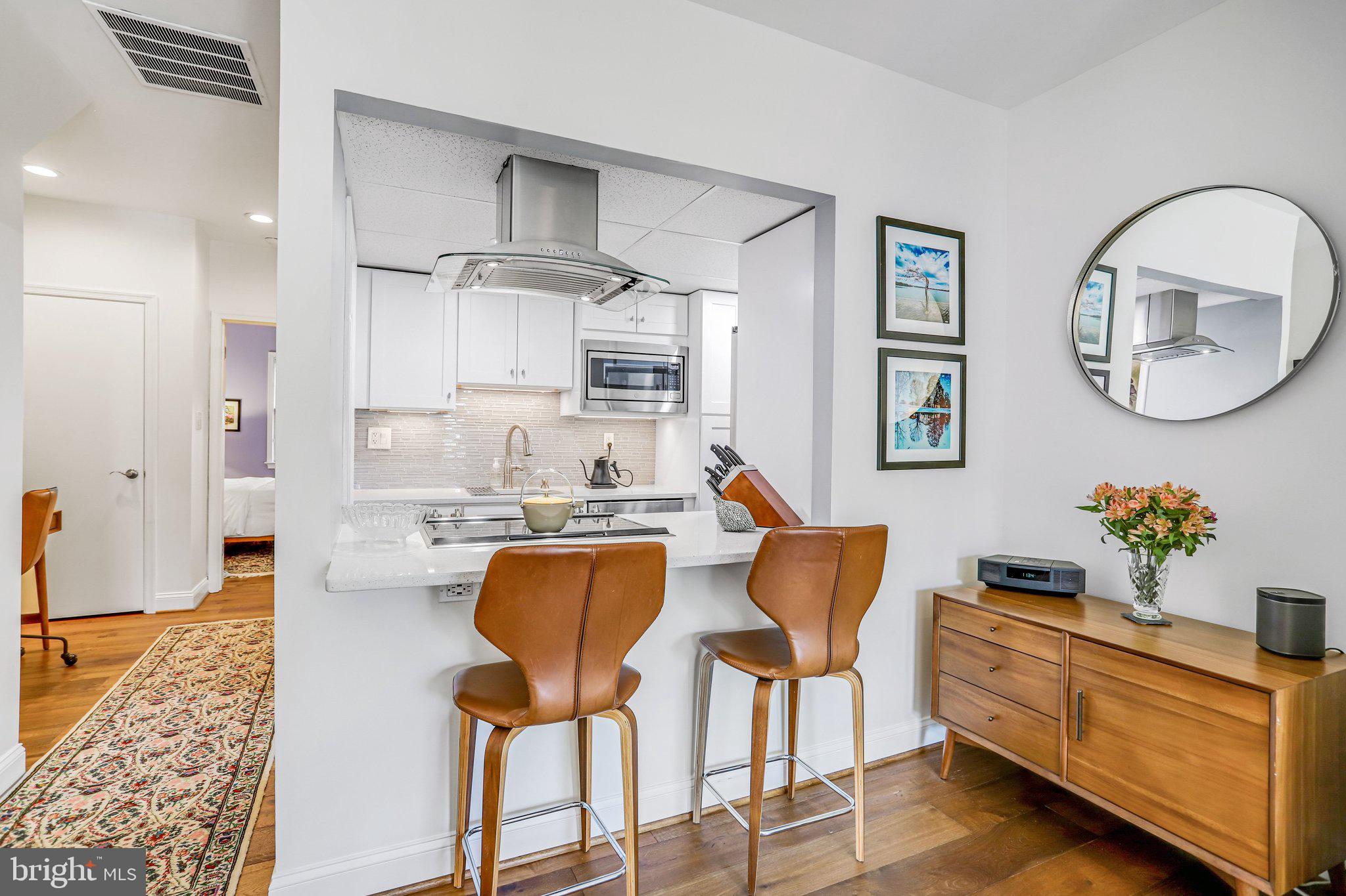212 3rd Street Northeast, Unit A Washington, DC 20002 - Photo 6 of 20 Countertop dining in totally renovated kitchen!