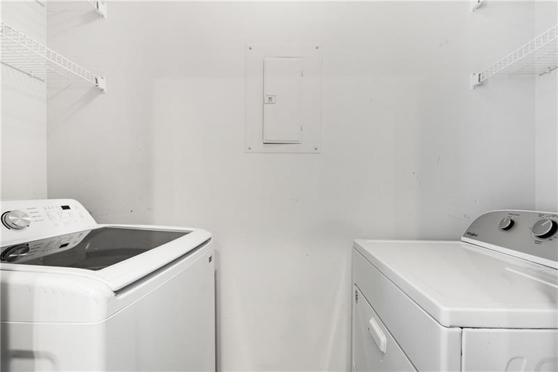 3324 Peachtree Road Northeast, Unit 1419 Atlanta, GA 30326 - Photo 16 of 43 a utility room with dryer and washer