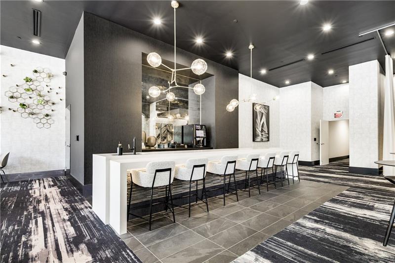 3324 Peachtree Road Northeast, Unit 1419 Atlanta, GA 30326 - Photo 20 of 43 a large kitchen with lots of counter space and chandelier