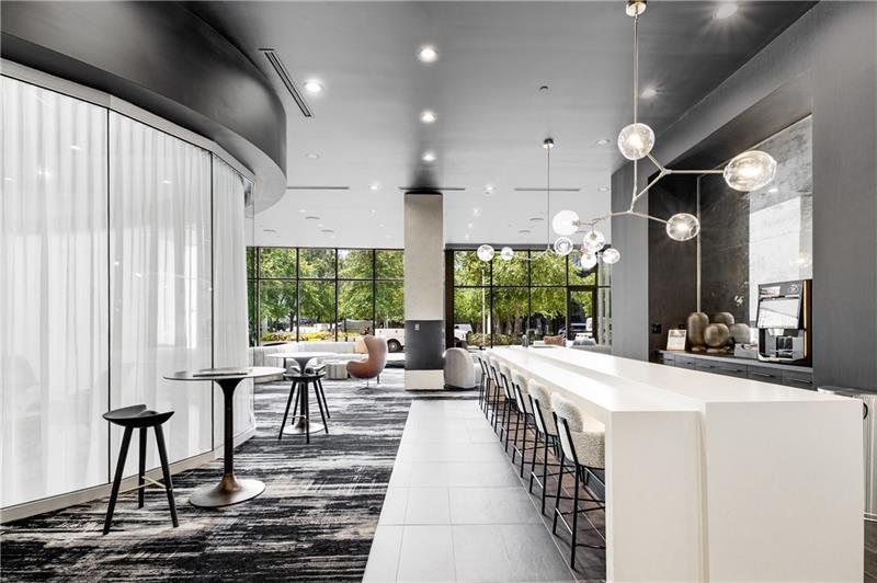 3324 Peachtree Road Northeast, Unit 1419 Atlanta, GA 30326 - Photo 22 of 43 a very nice looking living room with a large window and furniture