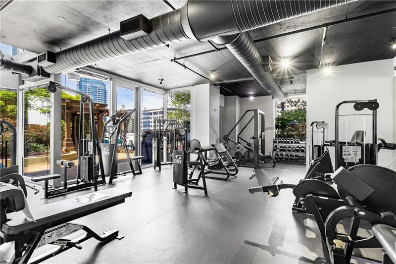 3324 Peachtree Road Northeast, Unit 1419 Atlanta, GA 30326 - Photo 27 of 43 a view of a room with gym equipment