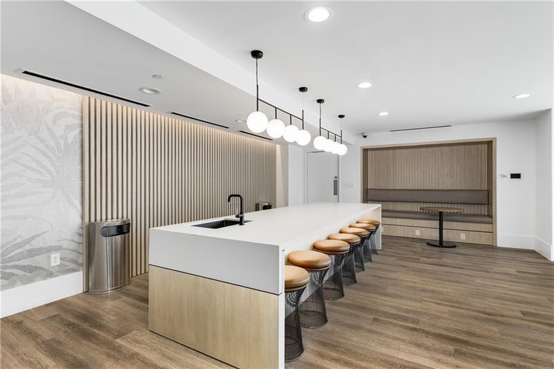 3324 Peachtree Road Northeast, Unit 1419 Atlanta, GA 30326 - Photo 29 of 43 a view of dining room and hall with wooden floor
