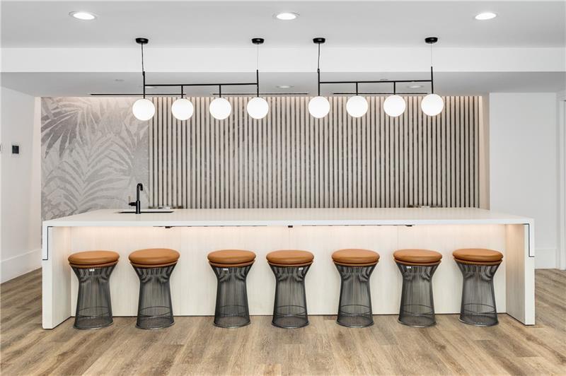 3324 Peachtree Road Northeast, Unit 1419 Atlanta, GA 30326 - Photo 30 of 43 a view of a kitchen with furniture and wooden floor