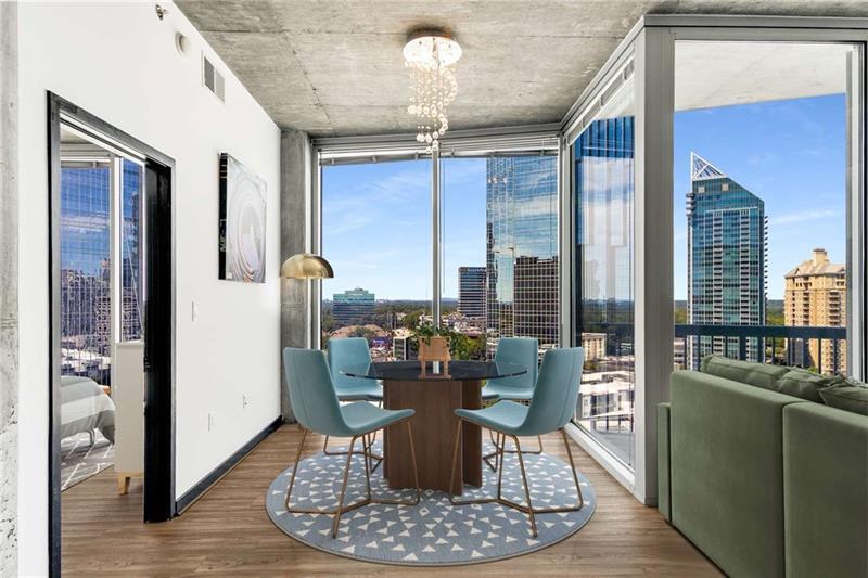 3324 Peachtree Road Northeast, Unit 1419 Atlanta, GA 30326 - Photo 9 of 43 a dining room with furniture a chandelier and wooden floor