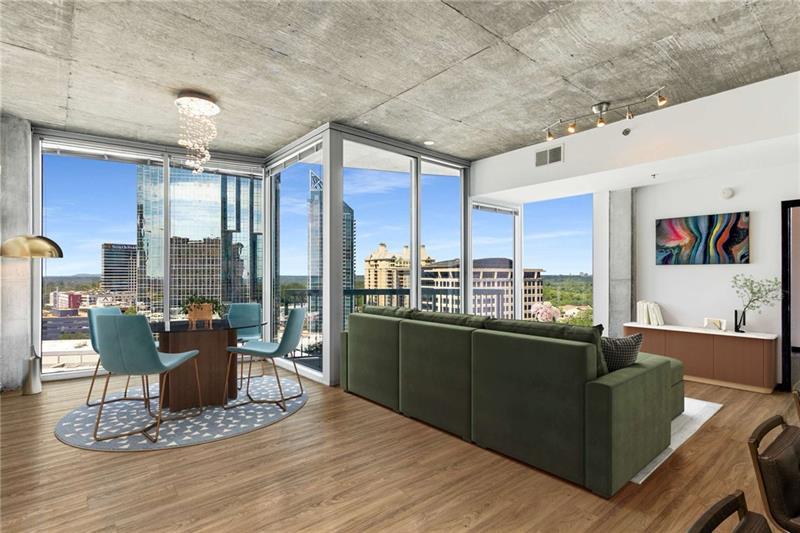 3324 Peachtree Road Northeast, Unit 1419 Atlanta, GA 30326 - Photo 10 of 43 a living room with couch and a table