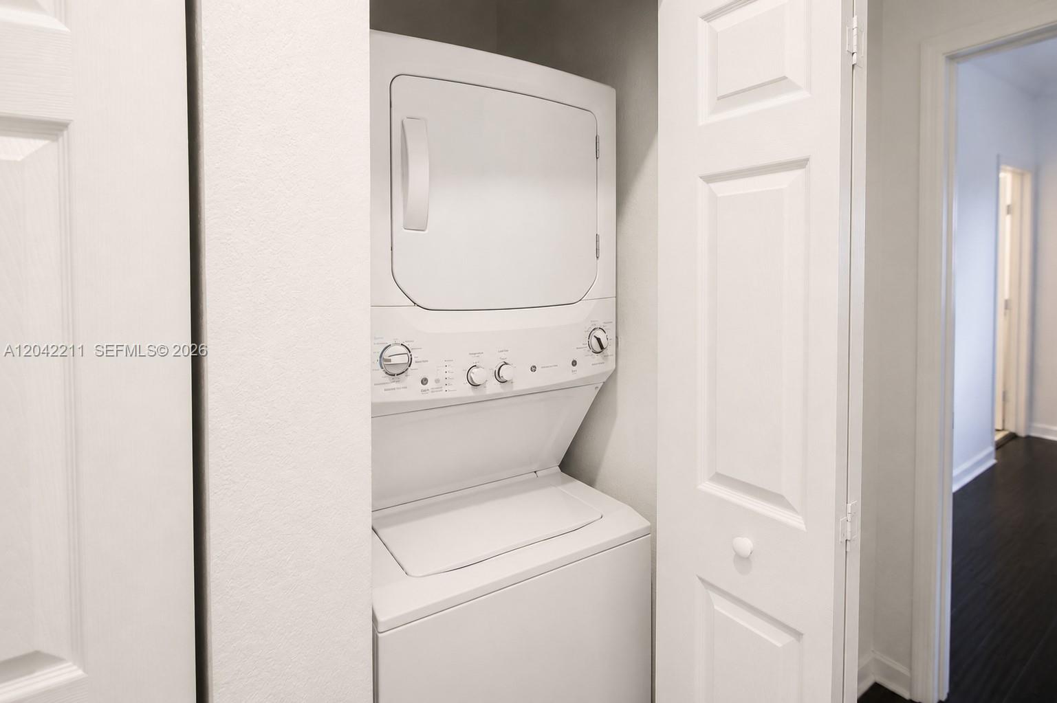 8954 West 35th Way Hialeah, FL 33018 - Photo 13 of 24 a utility room with dryer and washer