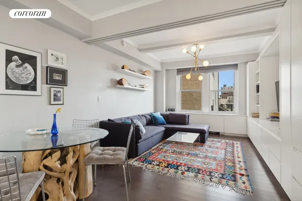 a view of a livingroom with furniture and wooden floor