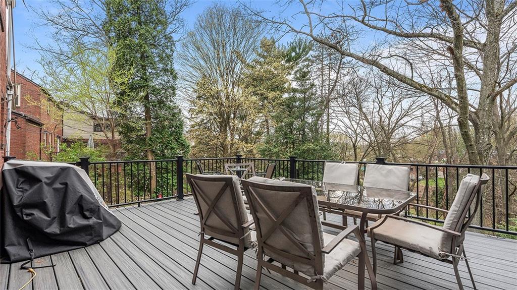 4720 Rolling Hills Road Pittsburgh, PA 15236 - Photo 13 of 34 a view of a chairs and table on the deck