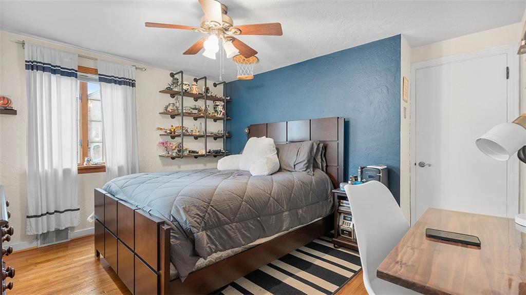 4720 Rolling Hills Road Pittsburgh, PA 15236 - Photo 20 of 34 a bedroom with a bed and window