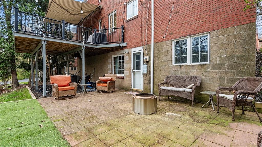 4720 Rolling Hills Road Pittsburgh, PA 15236 - Photo 28 of 34 a backyard of a house with barbeque oven table and chairs