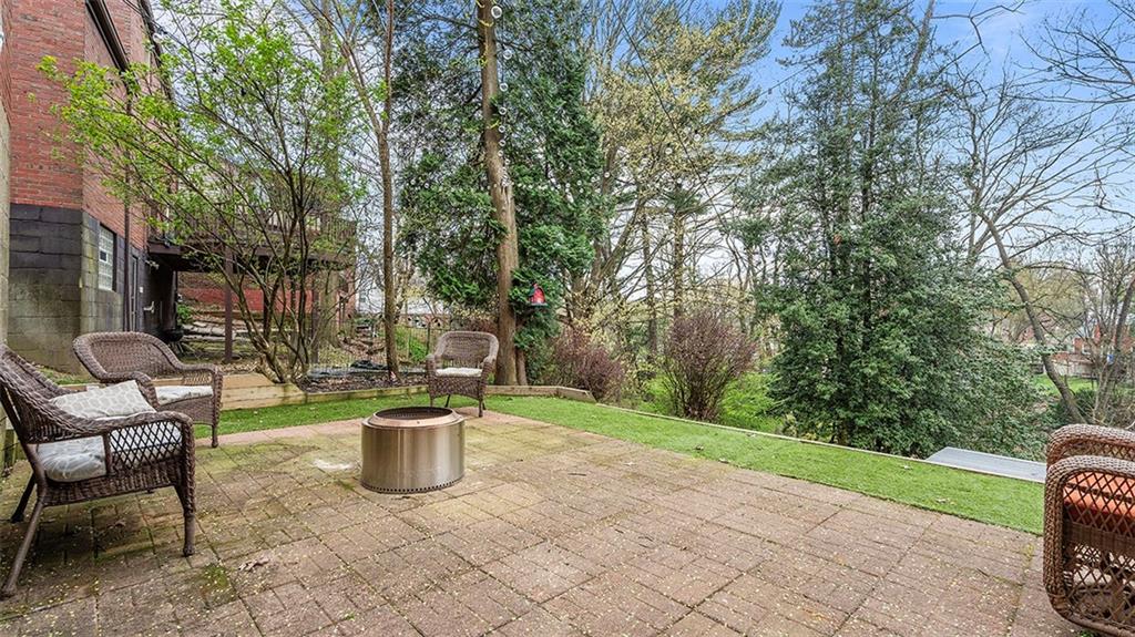 4720 Rolling Hills Road Pittsburgh, PA 15236 - Photo 29 of 34 a view of a chair and tables in the garden