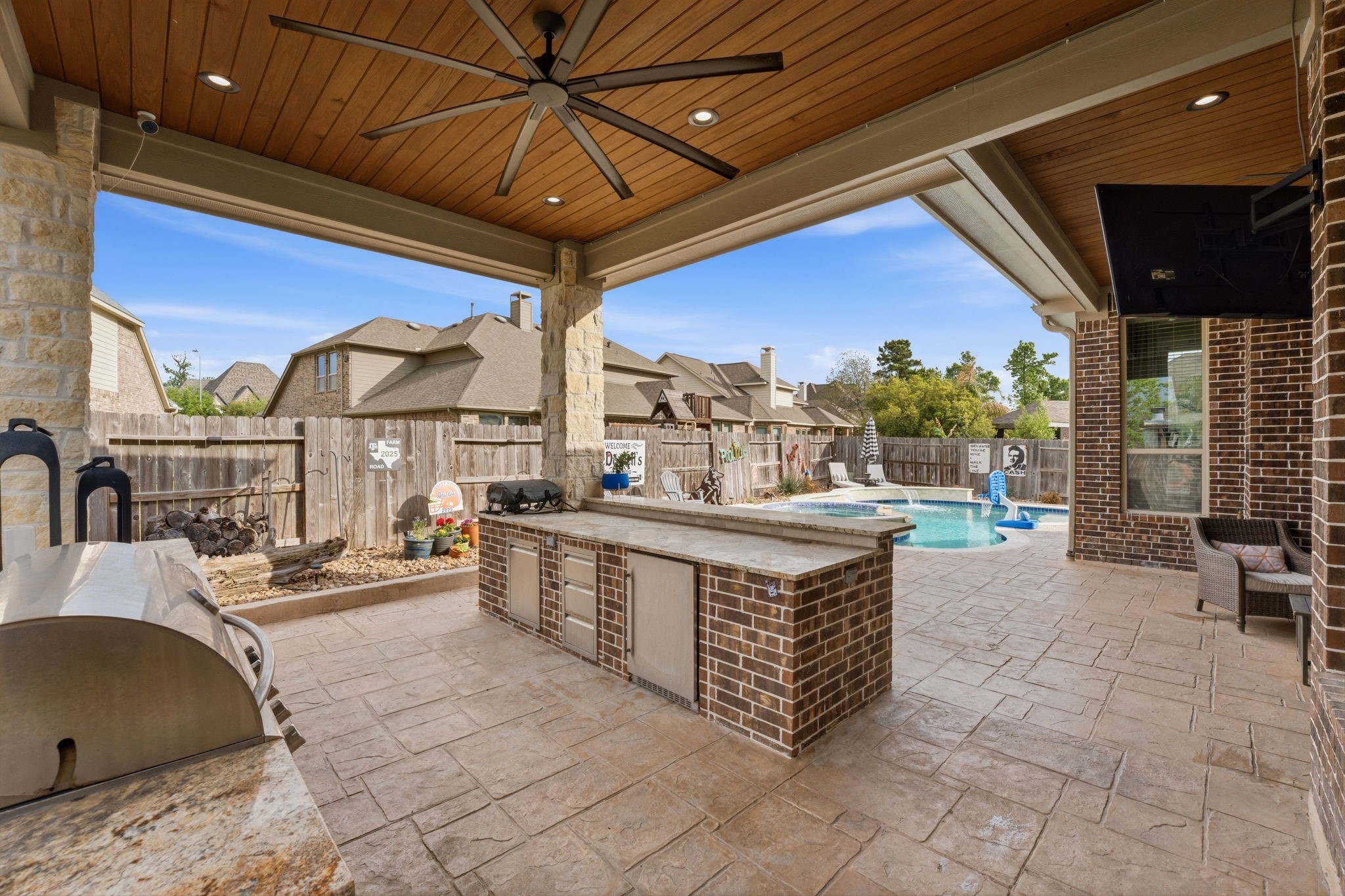 a view of living room kitchen and entryway