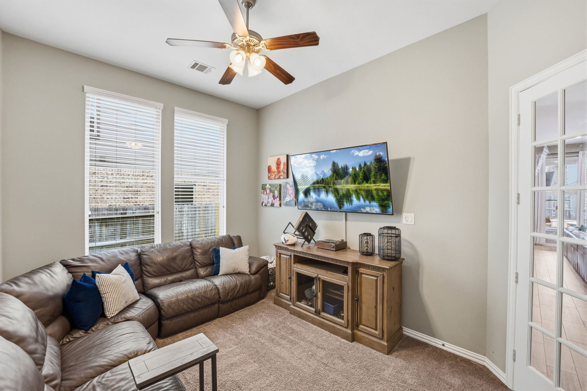 27906 Arden Trail Spring, TX 77386 - Photo 16 of 49 a living room with furniture and a flat screen tv