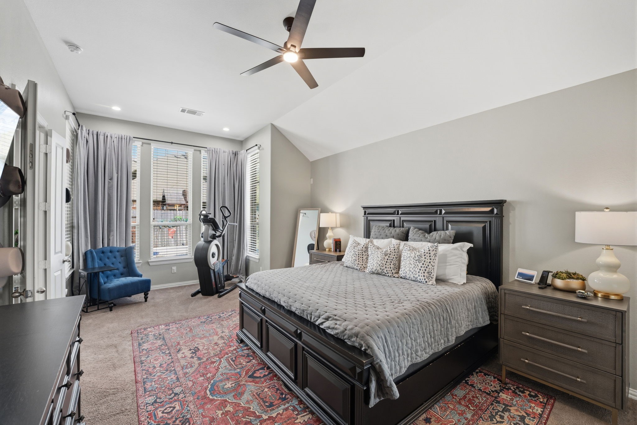 27906 Arden Trail Spring, TX 77386 - Photo 27 of 49 a bedroom with a bed a couch and a dresser