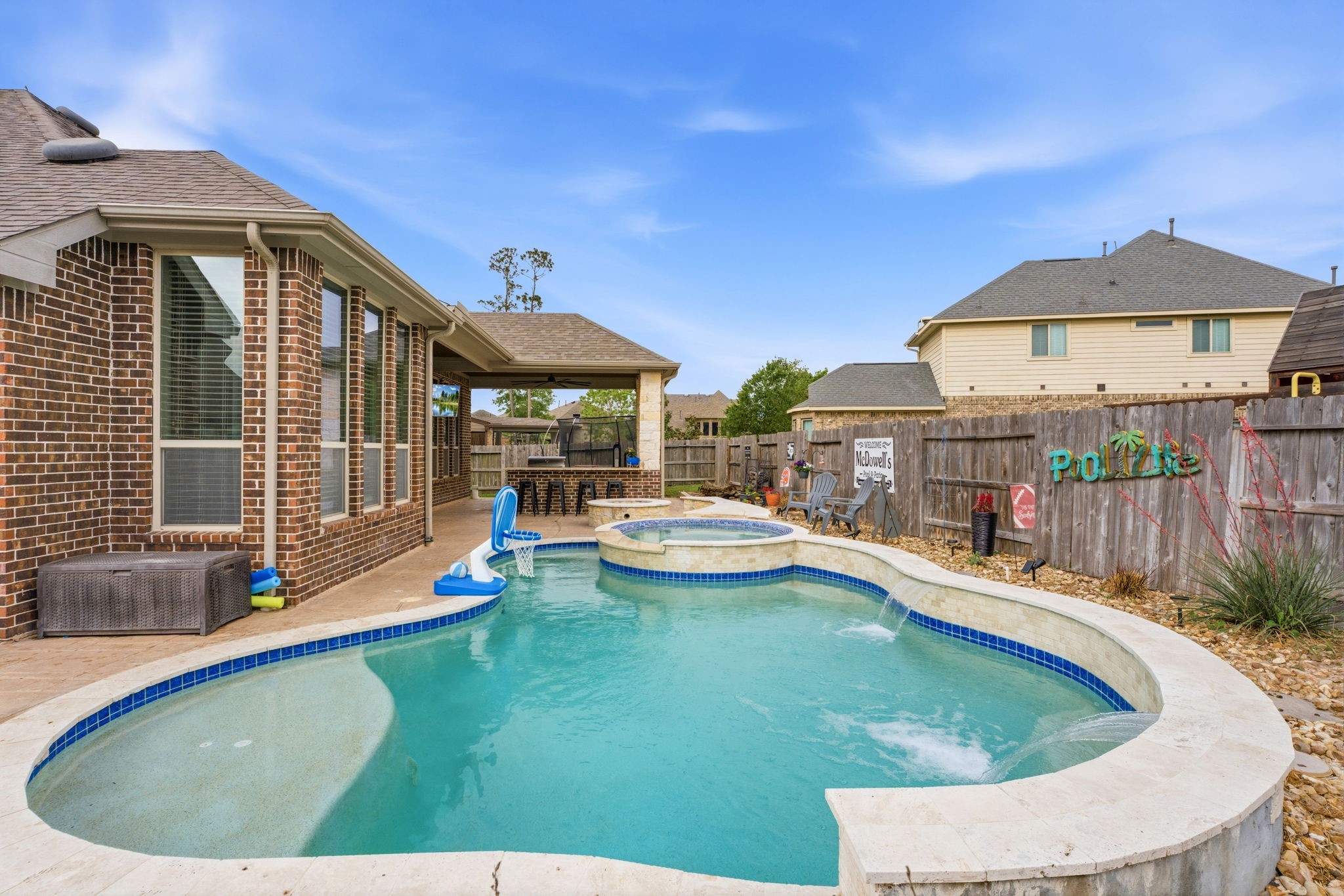 27906 Arden Trail Spring, TX 77386 - Photo 40 of 49 a view of a house with swimming pool and sitting area