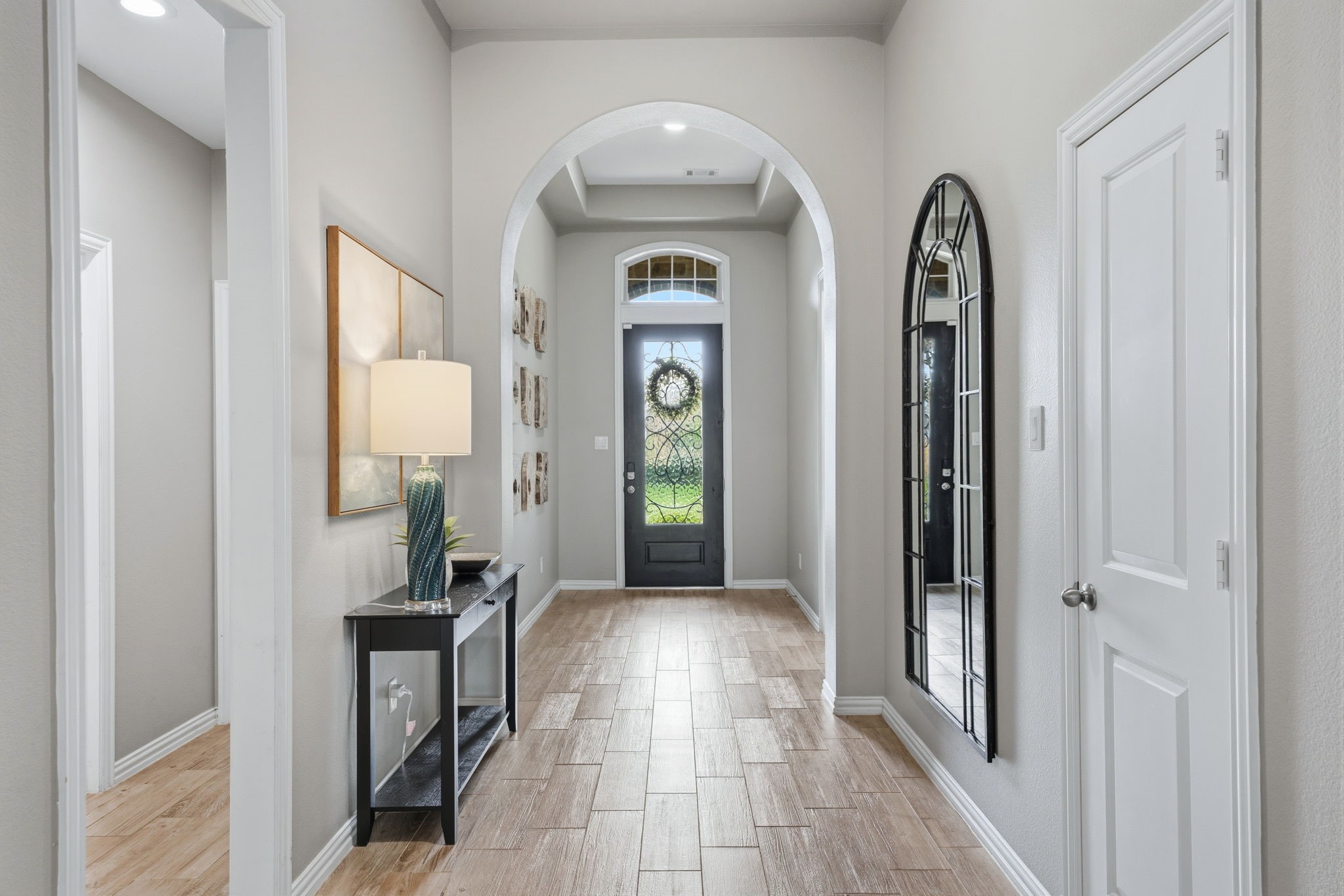 27906 Arden Trail Spring, TX 77386 - Photo 4 of 49 a view of an entryway with wooden floor
