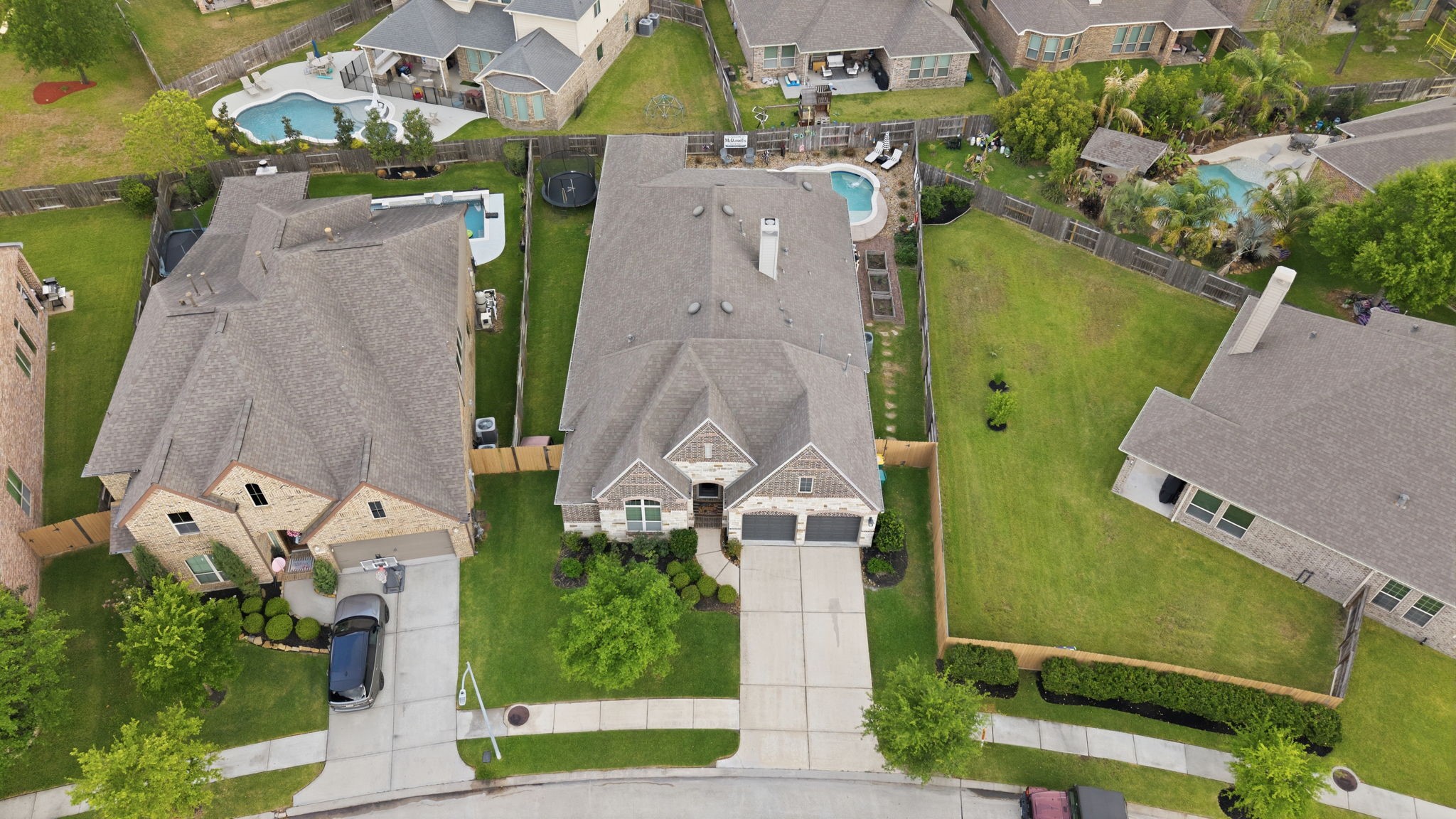 27906 Arden Trail Spring, TX 77386 - Photo 45 of 49 an aerial view of a house with a yard and pool