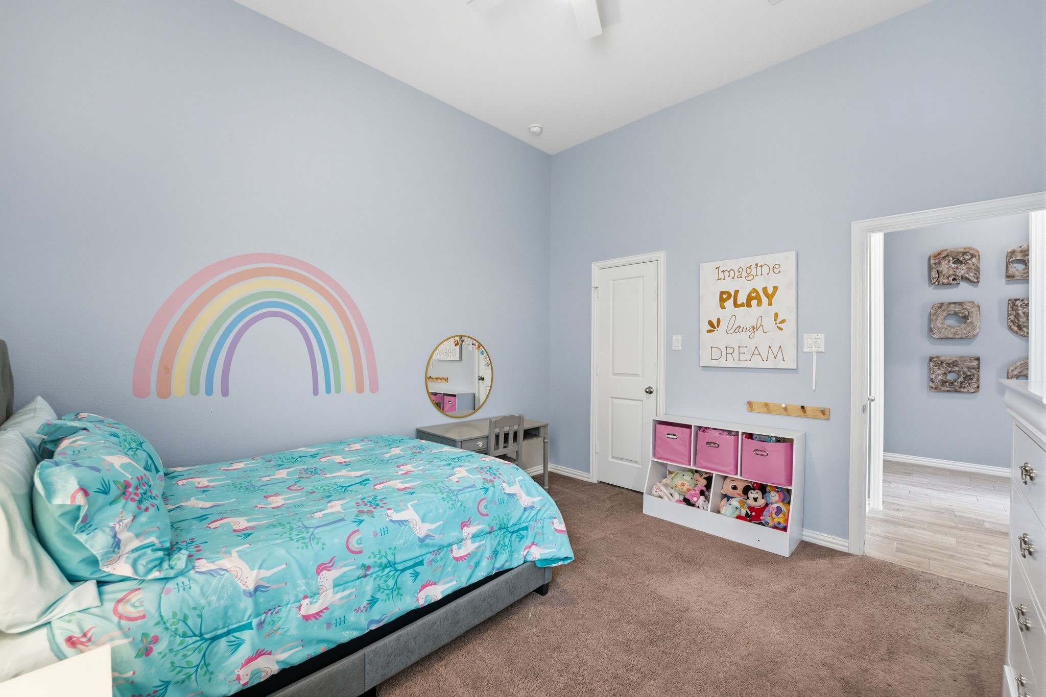 27906 Arden Trail Spring, TX 77386 - Photo 9 of 49 a bedroom with a bed and a dresser in it