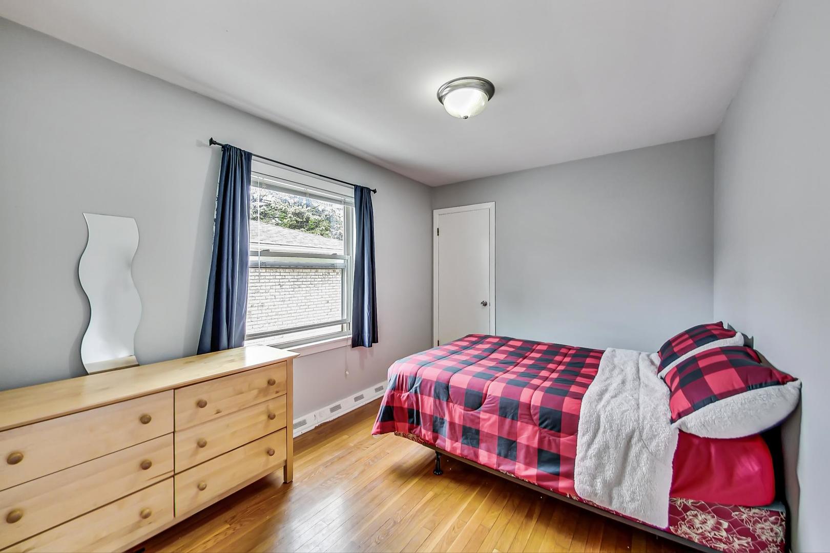1218 Elliott Street Park Ridge, IL 60068 - Photo 11 of 24 a bedroom with two beds and a window